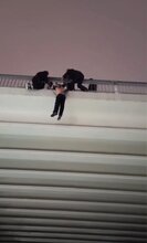 Russian Cops Rescue Half Naked Drunk Man Dangling From City Bridge